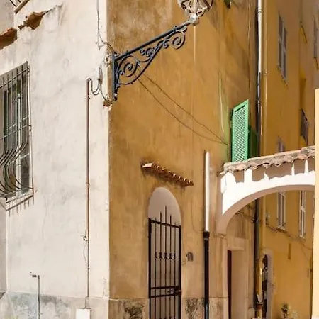 Between The Roofs Of Old Town And The Sea